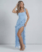Celestine Maxi Dress by Lauven, light blue sheer dress with ruffle details and thigh-high slit.