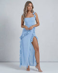 Lauven Celestine Maxi Dress - Elegant light blue sheer with ruffle accents and thigh-high slit.