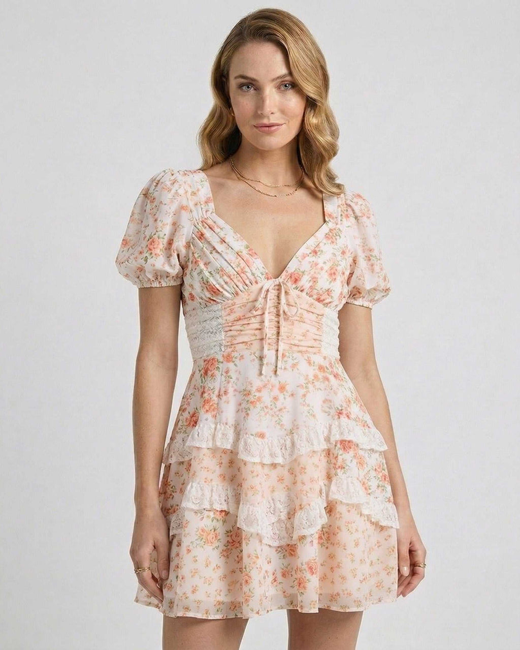 Coral Mini Dress by Lauven, lightweight floral print with tiered ruffles, elegant A-line silhouette.