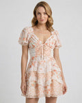 Coral Mini Dress by Lauven, lightweight floral print with tiered ruffles, elegant A-line silhouette.