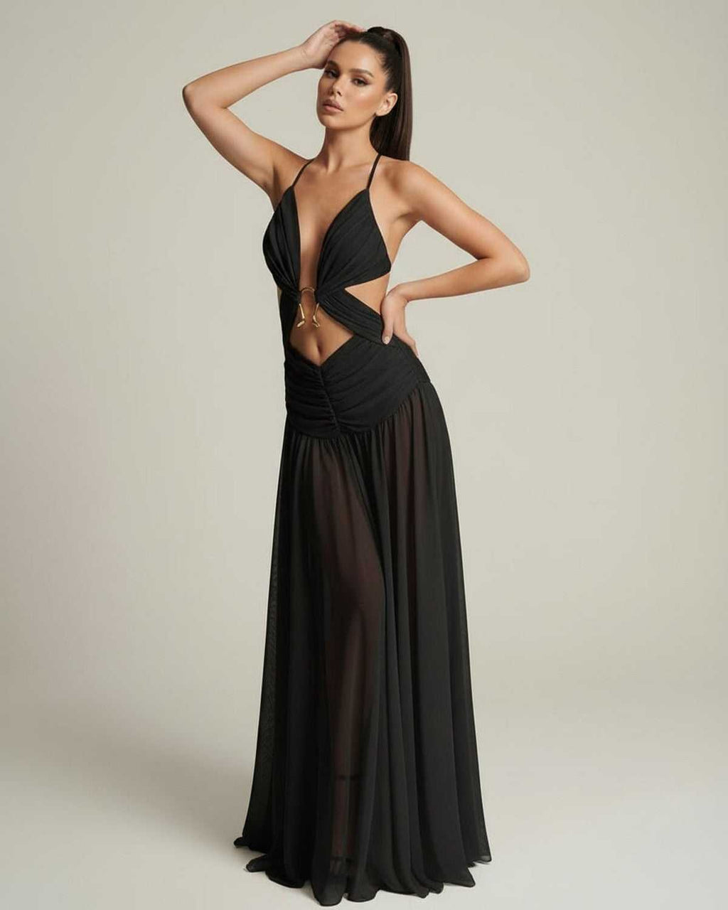 Eclipse Maxi Dress featuring a deep V-neck, cut-out detail, and flowing silhouette, perfect for elegant occasions by Lauven.