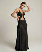 Eclipse Maxi Dress featuring a deep V-neck, sculptural cut-out detail, and flowing silhouette, by Lauven.