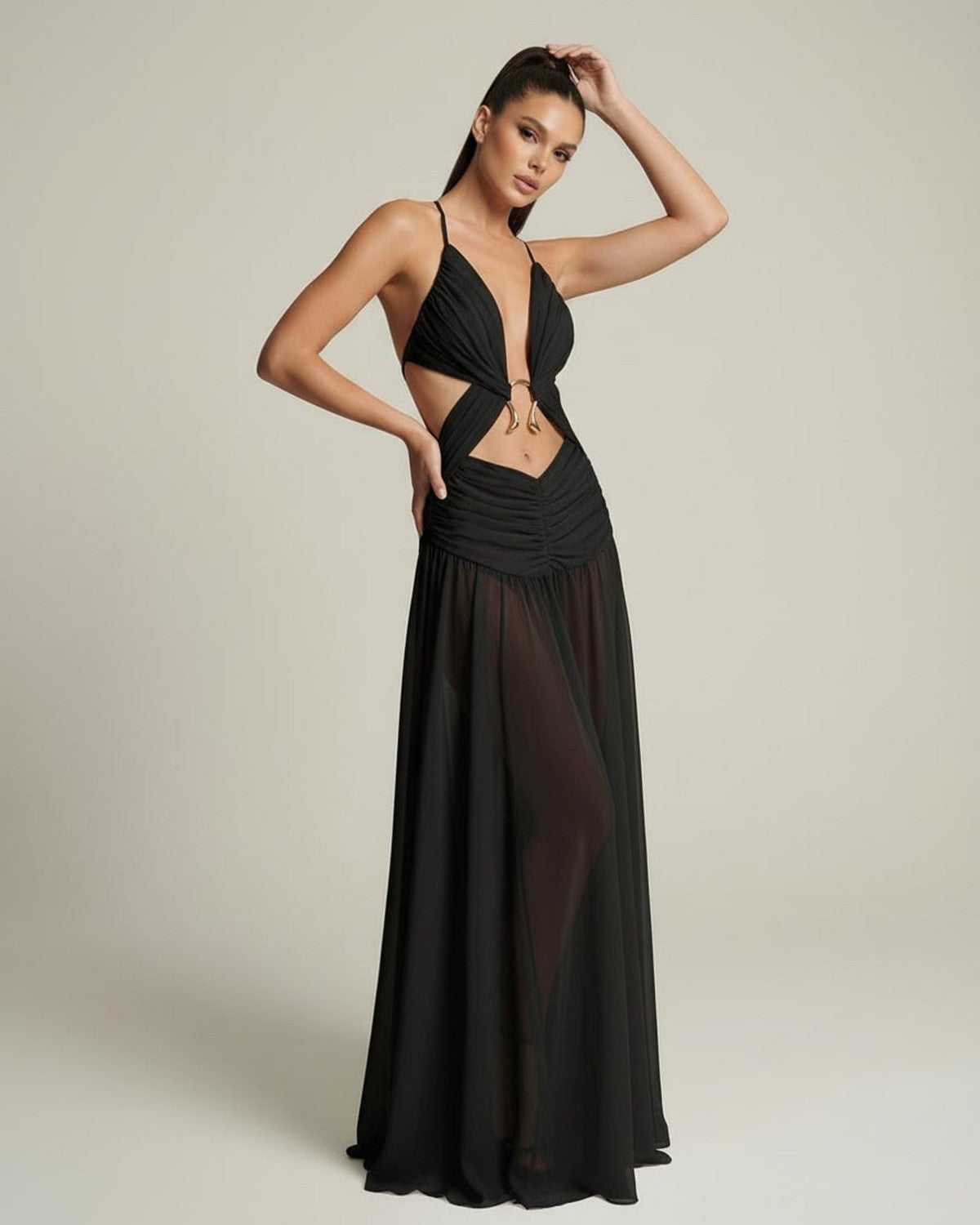 Eclipse Maxi Dress featuring a deep V-neck, sculptural cut-out detail, and flowing silhouette, by Lauven.