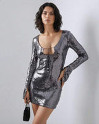 Eestella Mini Dress by Lauven features sequined shine and flared sleeves, perfect for a glamorous night out.