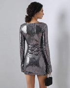 Lauven Eestella Mini Dress with sequined shine and flared sleeves, showcasing a modern silhouette in glamorous style.