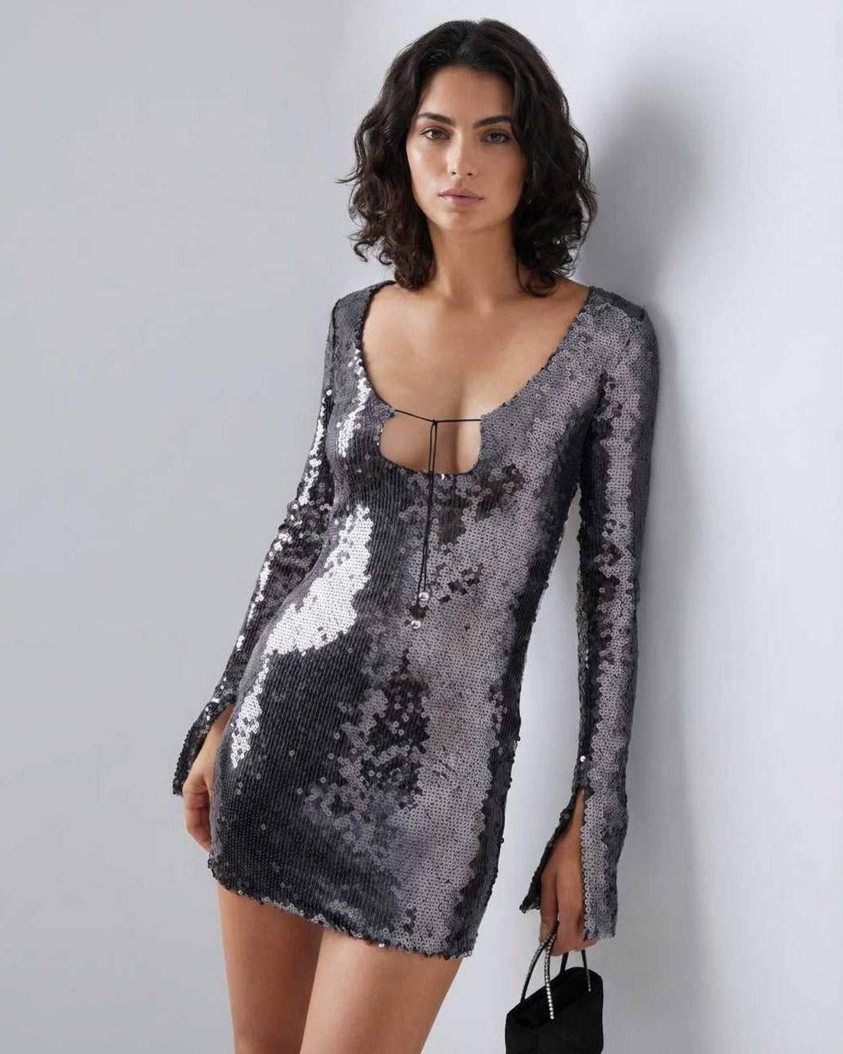 Lauven Eestella Mini Dress with sequined shine and flared sleeves, showcasing a sleek silhouette and modern design.