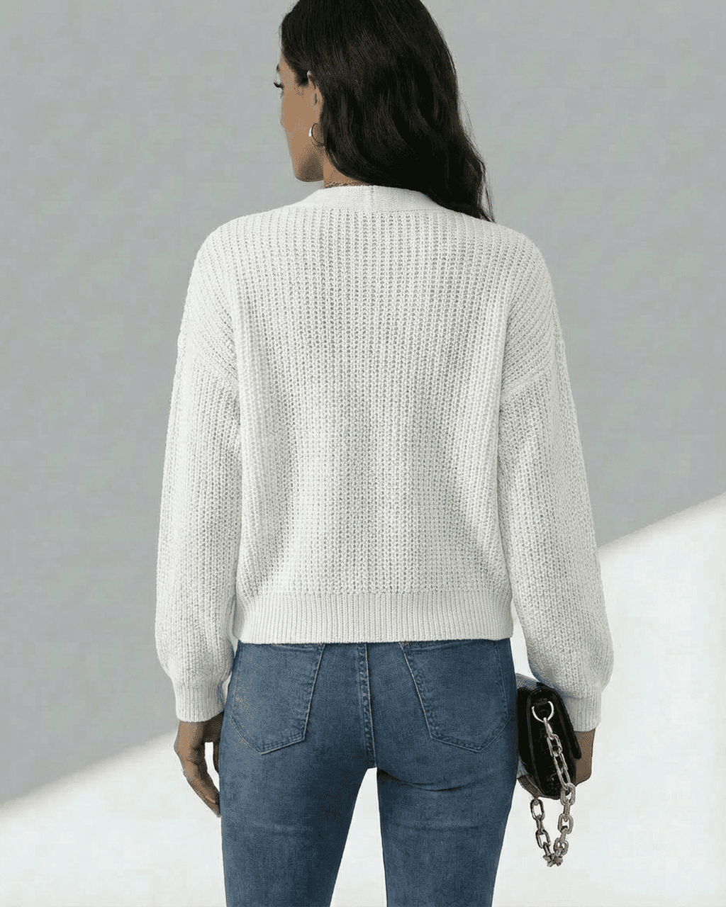 Women wearing Elara Cardigan from Lauven, showcasing its lightweight knit texture and relaxed fit.