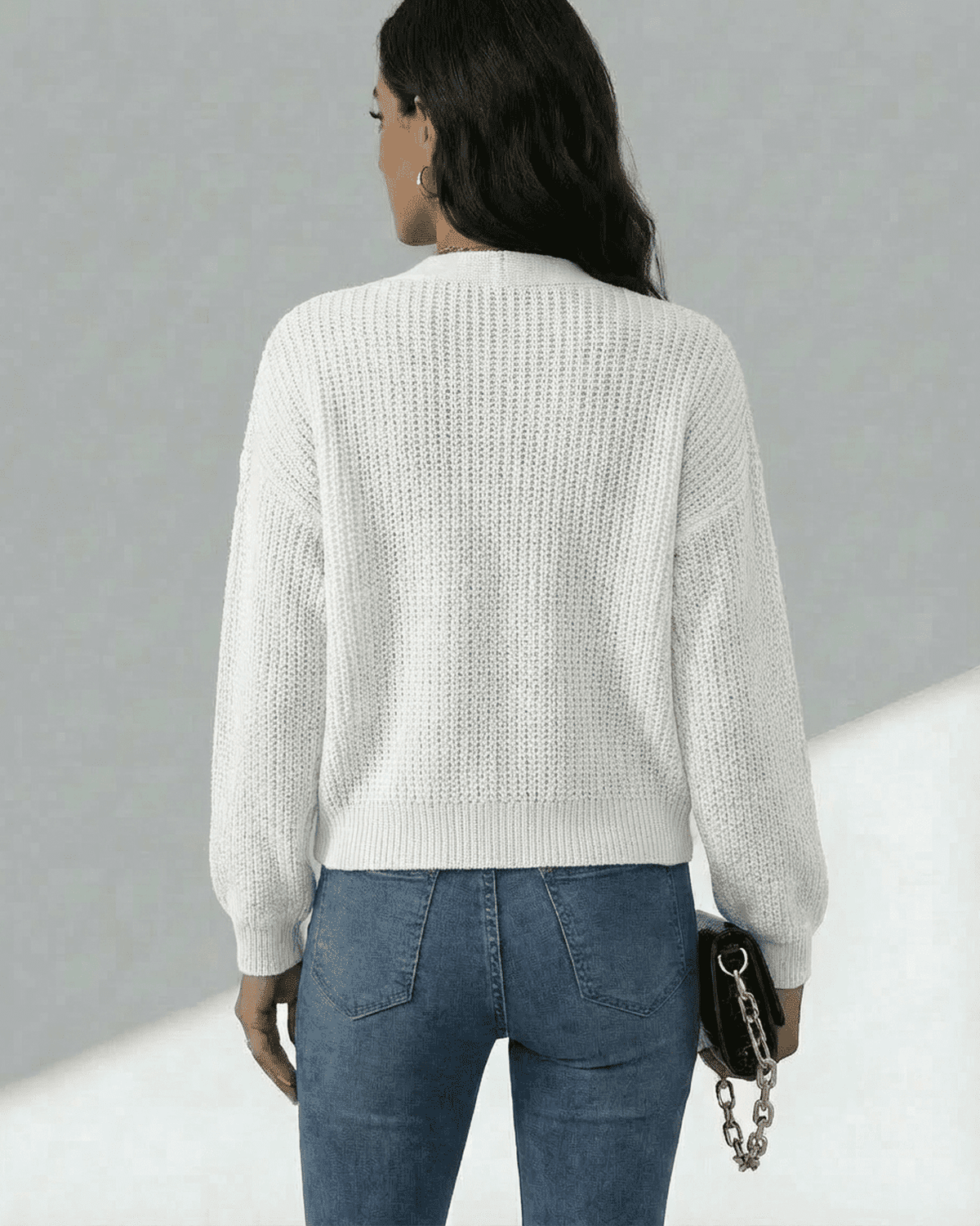 Women wearing Elara Cardigan from Lauven, showcasing its lightweight knit texture and relaxed fit.