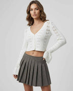 Elara Cardigan white cropped sweater with V-neckline and openwork knit by Lauven, perfect for elegant everyday style.