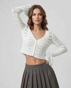 Elara Cardigan: White cropped cardigan sweater with openwork knit, modern V-neckline, by Lauven.