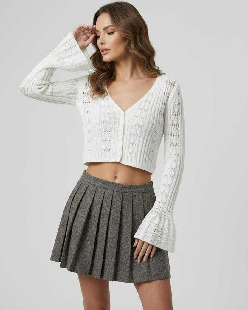 Elara Cardigan white cropped cardigan sweater with bell sleeves, V-neckline, and elegant openwork detailing by Lauven.