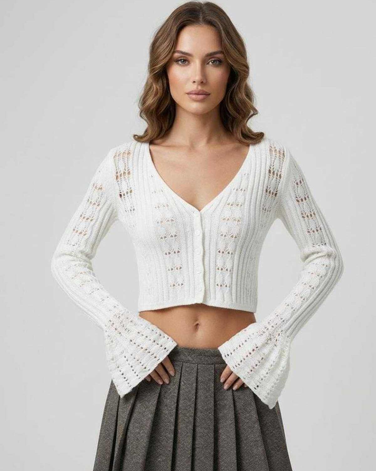 Elara Cardigan featuring a cropped silhouette, V-neckline, and openwork knit detailing by Lauven.