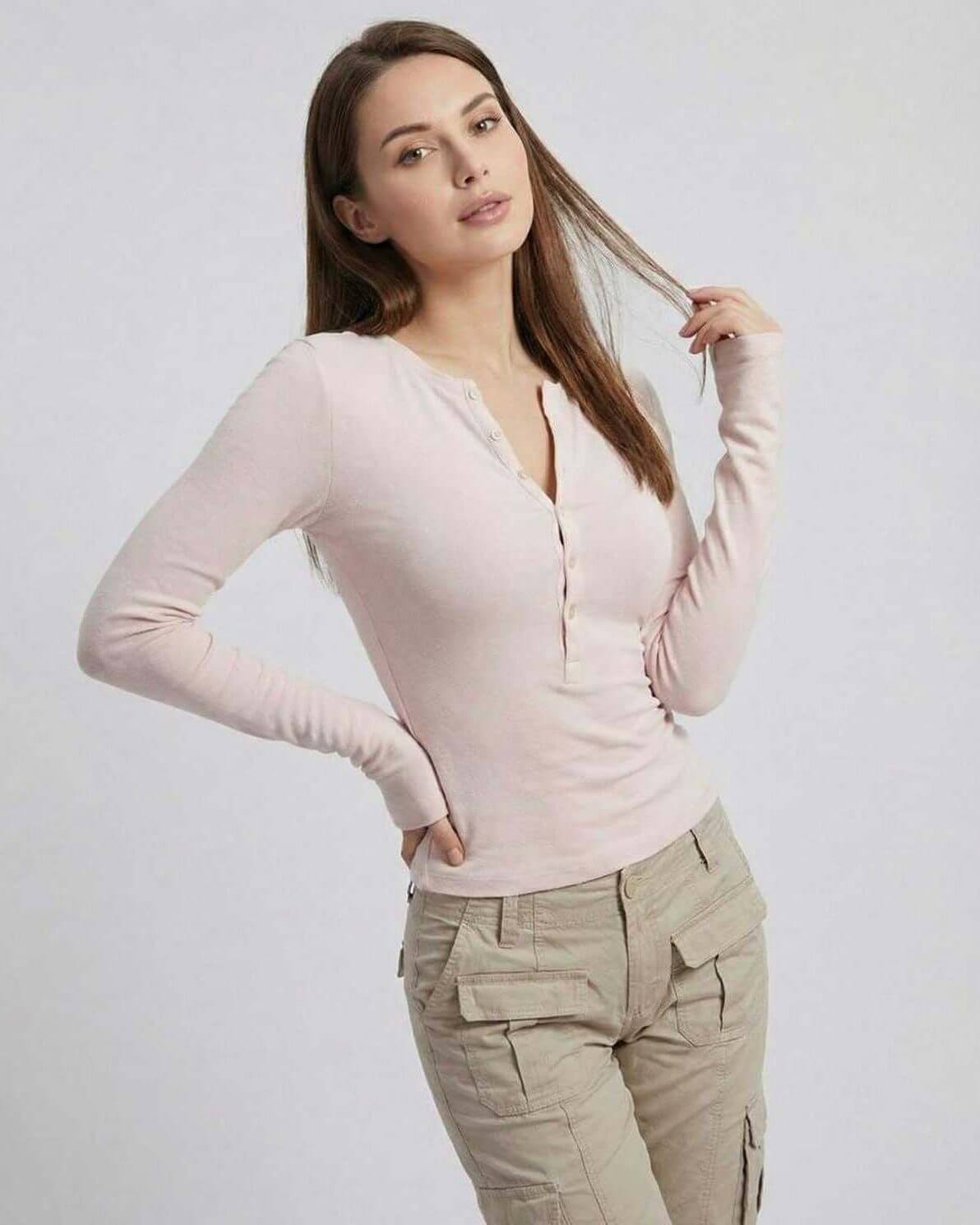 Elara Long Sleeve – Women’s pink long sleeve top by Lauven with a slim fit viscose design and half-open neckline.