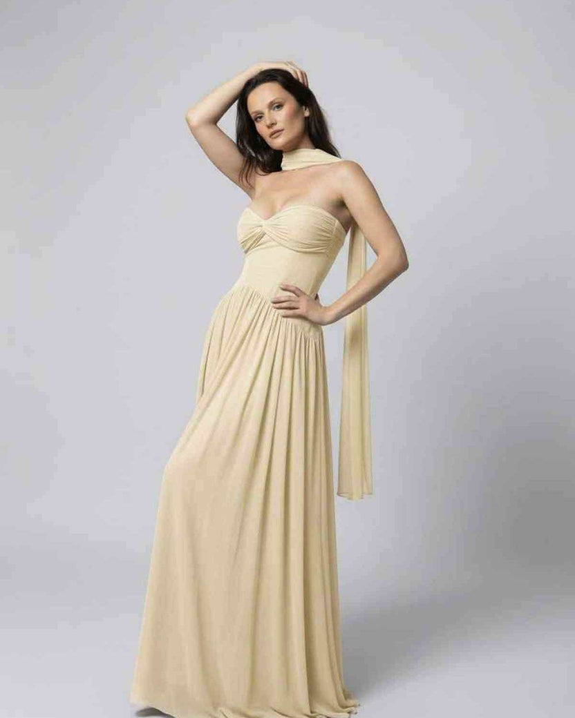 Elara Maxi Dress, beige strapless design with choker scarf, elegant flowing style by Lauven.