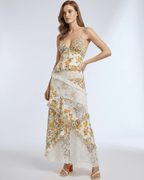 Elara Maxi Dress featuring floral lace ruffle design, lightweight fabric, and asymmetrical styling by Lauven.