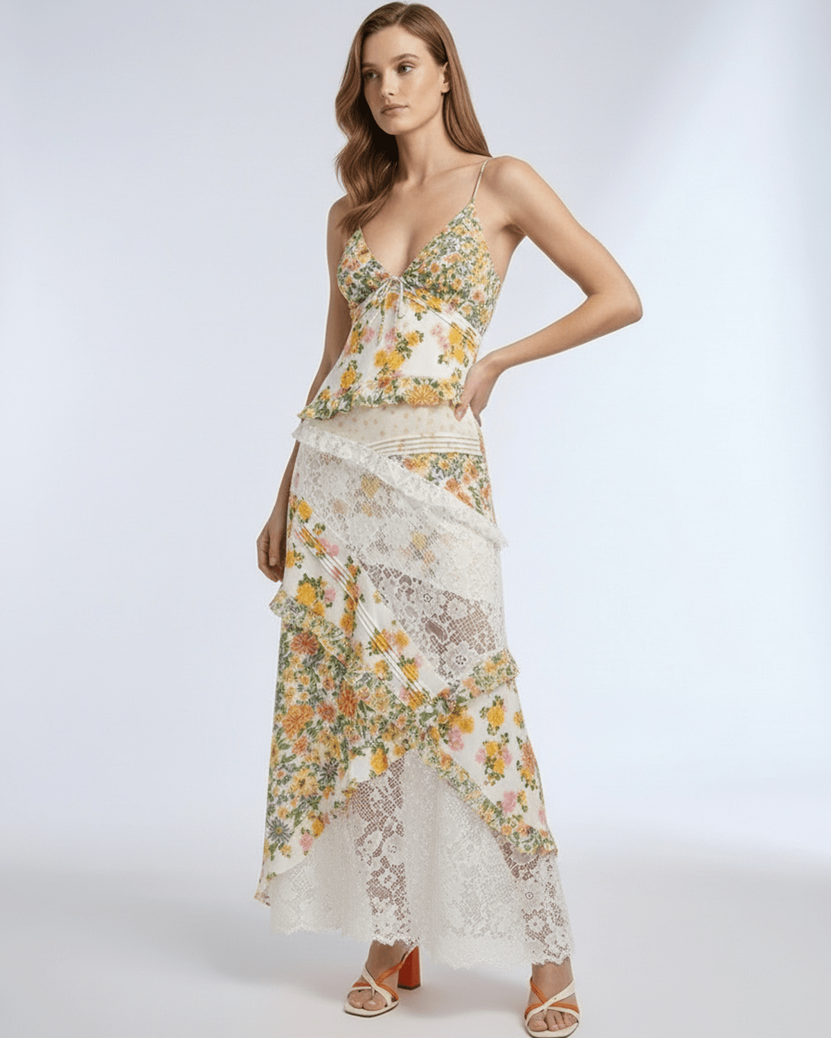 Elara Maxi Dress featuring floral lace ruffle design, lightweight fabric, and asymmetrical styling by Lauven.