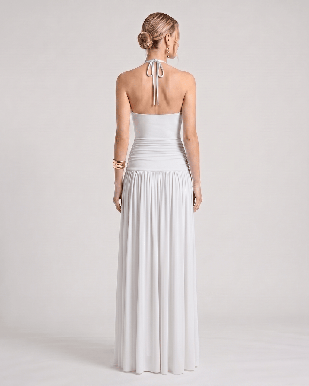Elara Maxi Dress back view showcasing halter neck, smooth stretch jersey, and flowing silhouette by Lauven.