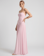 Elara Maxi Dress in soft pink stretch jersey, featuring halter neck and elegantly flowing skirt for a refined look by Lauven.