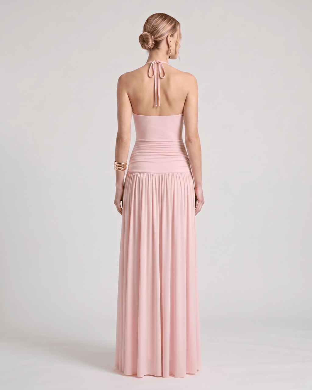 Elara Maxi Dress featuring a halter neck, ruched waist, flowing skirt, made of soft stretch jersey by Lauven.