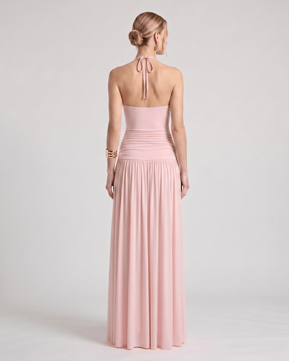 Elara Maxi Dress featuring a halter neck, ruched waist, flowing skirt, made of soft stretch jersey by Lauven.