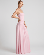 Elara Maxi Dress in soft pink stretch jersey, featuring a halter neck and flattering, fluid skirt for an elegant look by Lauven.