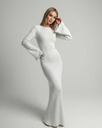 Elara Maxi Dress - White A-Line dress with flare sleeves and backless detail by Lauven, showcasing modern elegance.