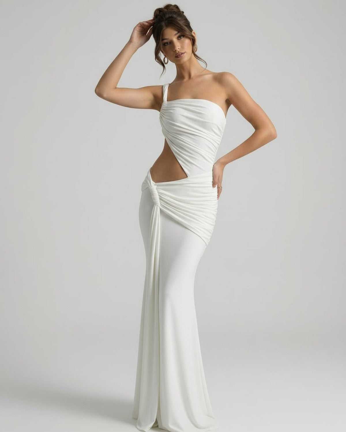 Elara Maxi Dress featuring asymmetrical draping, backless design, and sculptural elegance by Lauven.