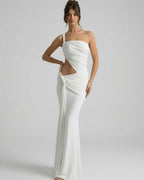 Elara Maxi Dress featuring asymmetrical draping, backless design, and elegant side cutout by Lauven.