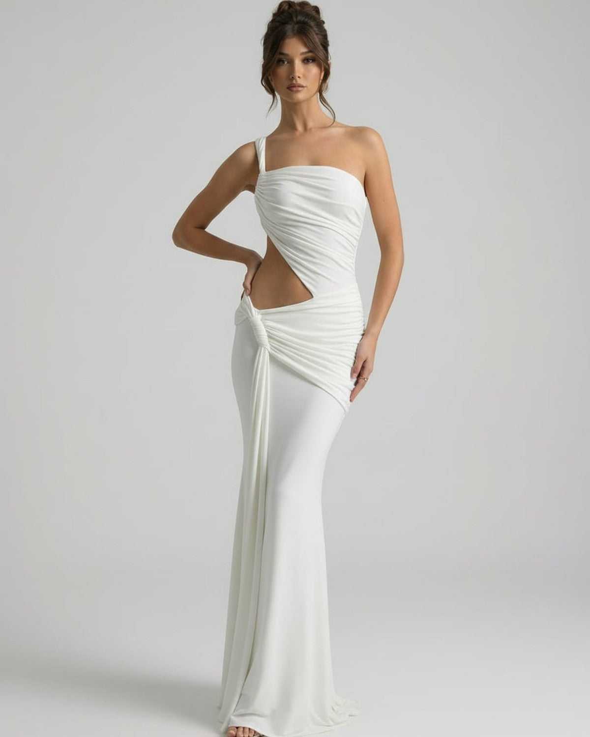 Elara Maxi Dress featuring asymmetrical draping, backless design, and elegant side cutout by Lauven.