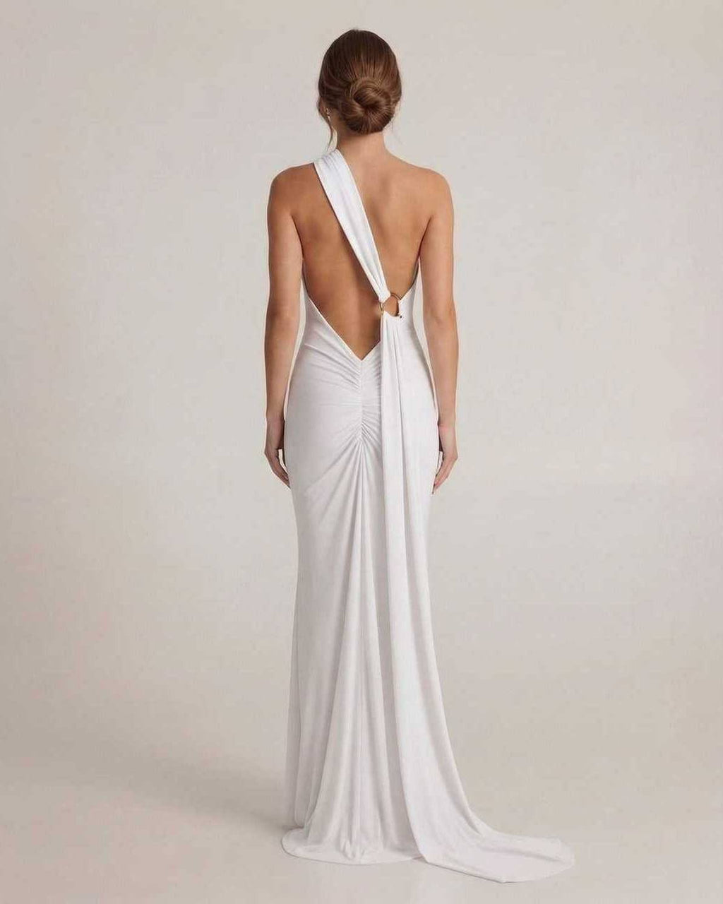 Elara Maxi Dress – Back view showing halter neck, open back, elongated sash detail by Lauven in white.