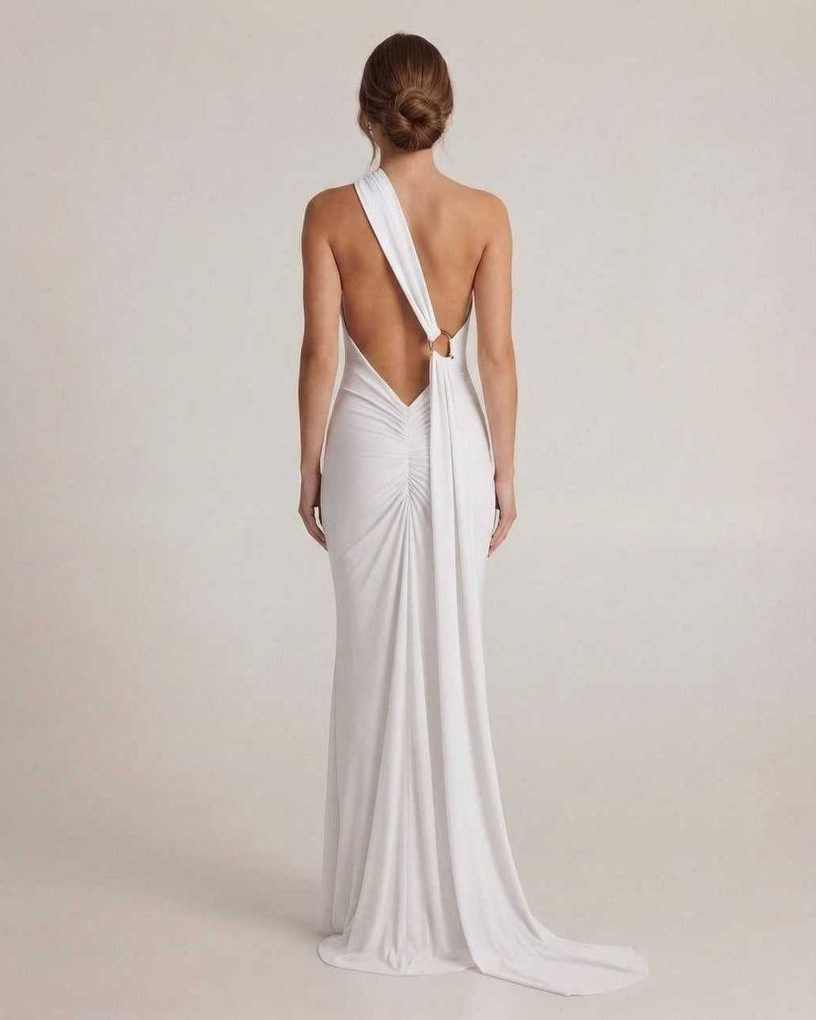 Elara Maxi Dress – Back view showing halter neck, open back, elongated sash detail by Lauven in white.