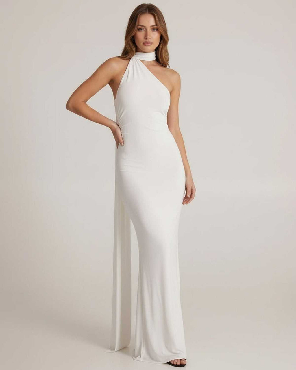 Elara Maxi Dress featuring a sculptural halter neck and open back sash detail, by Lauven.