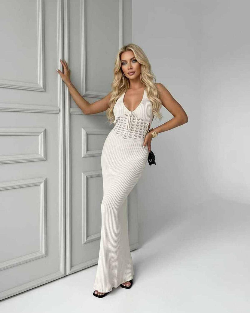 Elara Maxi Dress in white knit with deep V-neck, ribbed silhouette and elegant style by Lauven.