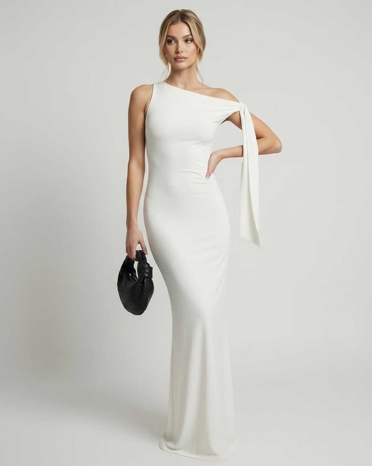 Elara Maxi Dress - Elegant white one shoulder maxi dress by Lauven, featuring a sleek silhouette and floor-length design.