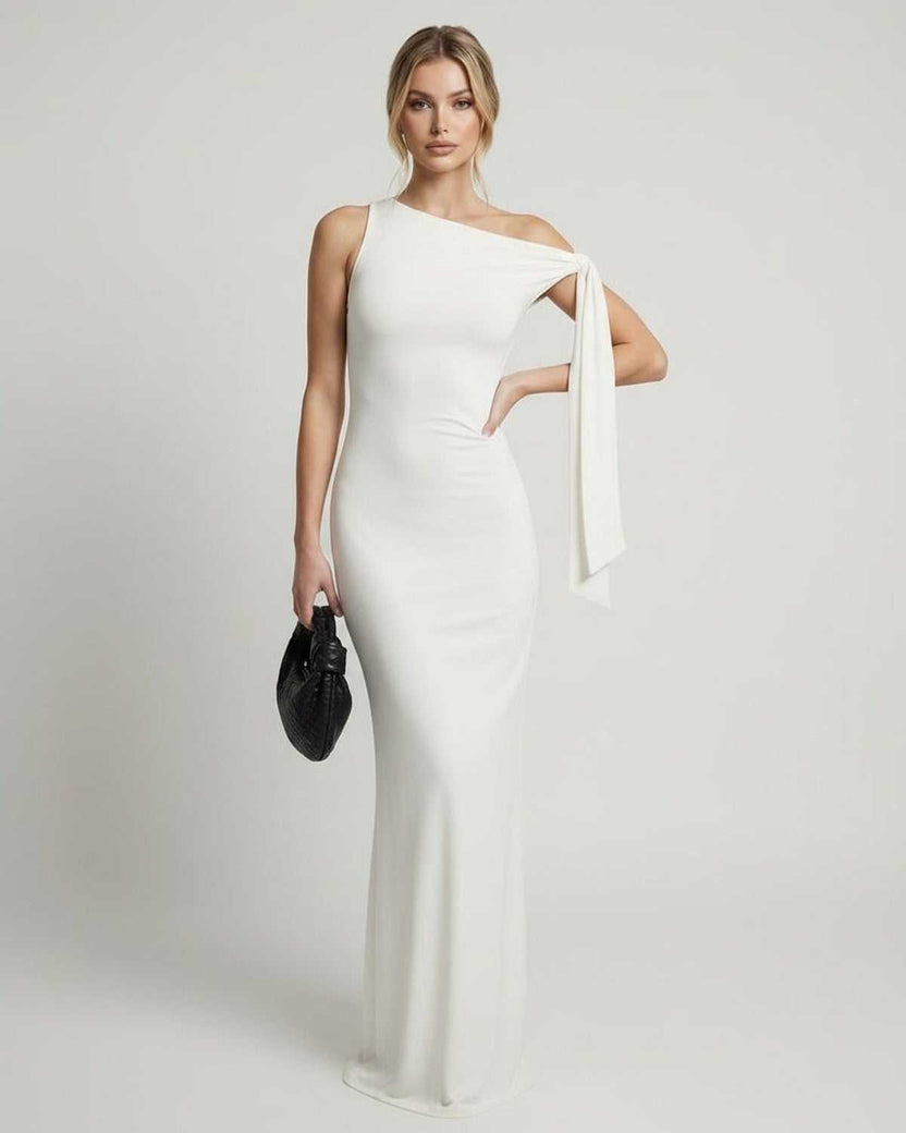 Elara Maxi Dress – White one shoulder maxi dress with elegant floor length silhouette from Lauven, offering a sleek and refined look.