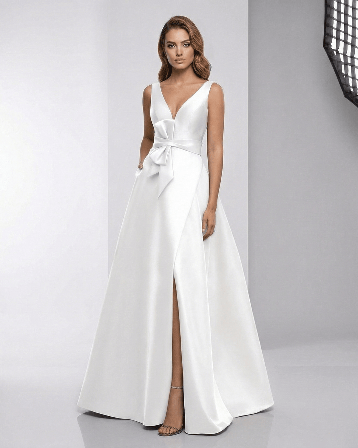 Elara Maxi Dress - white satin A-line gown with V-neck, bow detail, elegant floor-length silhouette by Lauven.