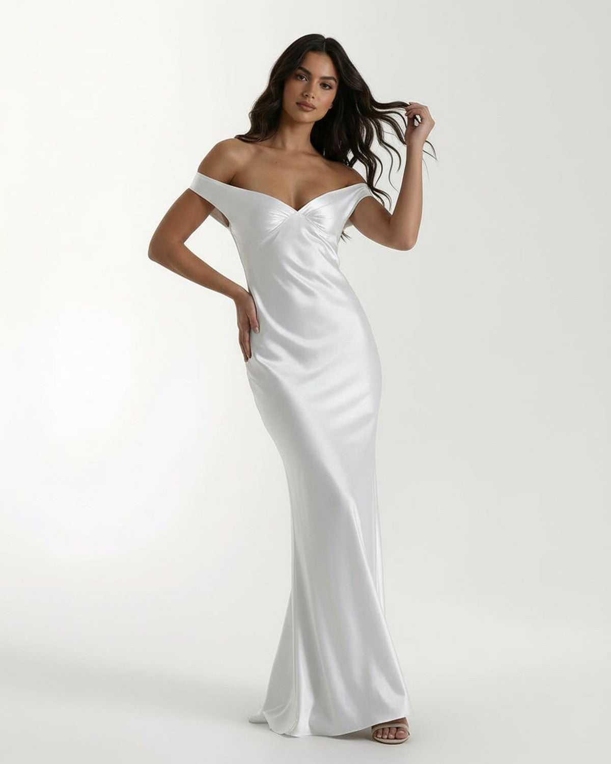 Elara Maxi Dress - Off shoulder white satin outfit showcasing modern elegance and a fluid silhouette by Lauven.