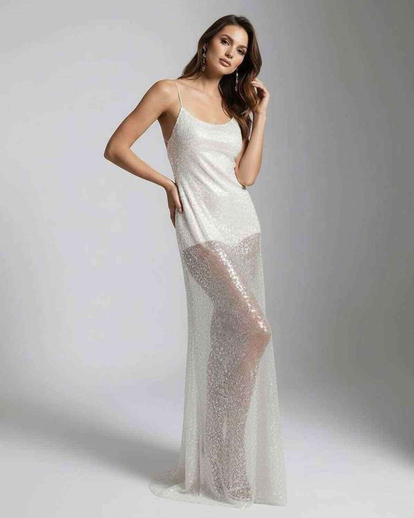 Elara Maxi Dress showcasing a white sequin design with strappy back, exuding elegance and a fluid silhouette by Lauven.