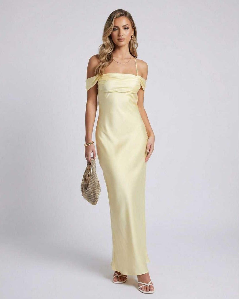 Elara Maxi Dress in soft yellow, off-the-shoulder design, featuring sleek slip silhouette by Lauven.