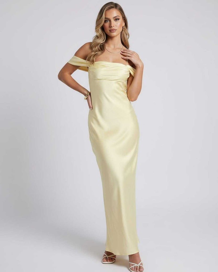 Elara Maxi Dress featuring a yellow off-the-shoulder slip silhouette, crafted by Lauven for a polished, elegant look.