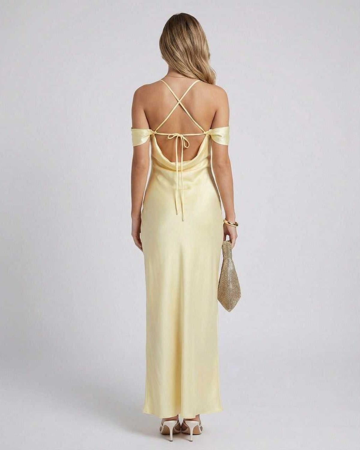 Elara Maxi Dress back view showcasing off-the-shoulder design, satin finish and elegant silhouette by Lauven.