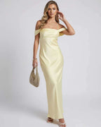 Elara Maxi Dress in yellow with off-the-shoulder design, featuring a sleek slip silhouette, by Lauven.