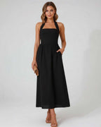 Elara Midi Dress, elegant black halter neckline, flowy A-line silhouette, Lauven brand, breathable comfort