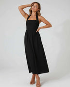 Elara Midi Dress - Elegant black halter midi dress with flowy A-line silhouette by Lauven, perfect for all-day wear.