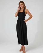 Elara Midi Dress – Elegant black halter midi dress with flowing A-line silhouette by Lauven, flattering and modern.
