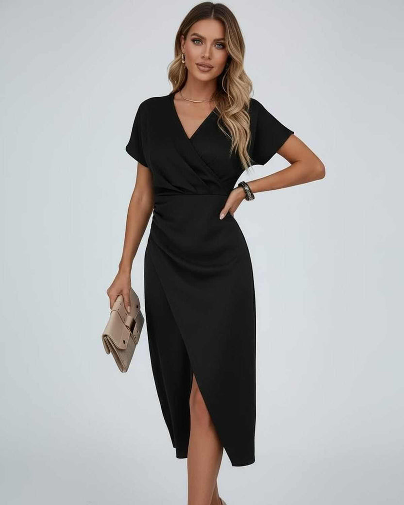 Elara Midi Dress by Lauven – Elegant black wrap dress with modern silhouette and flowing fabric.