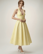 Elara Midi Dress - Elegant halter A-line silhouette, structured fit, and sophisticated yellow color by Lauven.