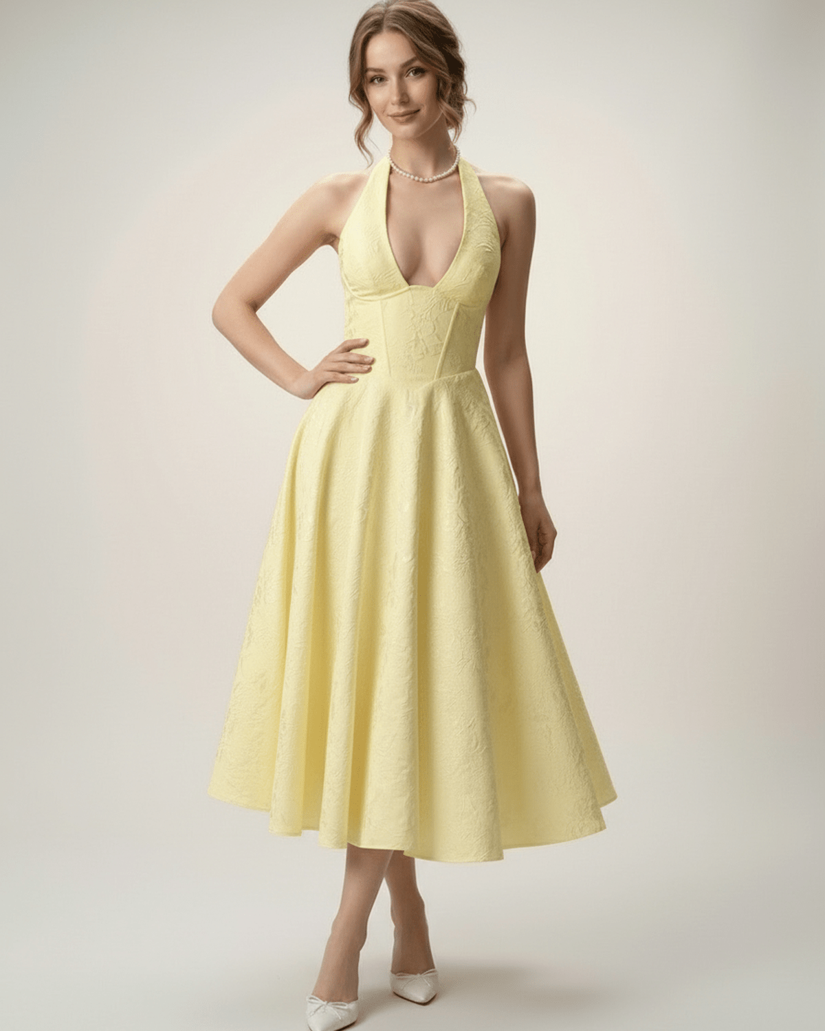 Elara Midi Dress in yellow with halter neckline, A-line silhouette, and structured fit by Lauven for elegant occasions.