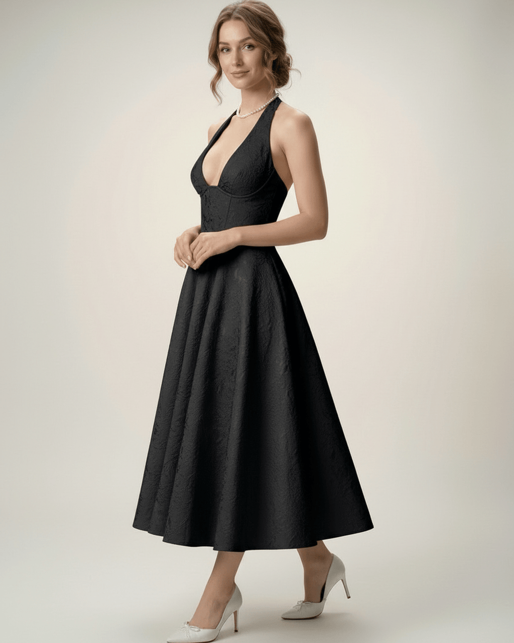 Elara Midi Dress by Lauven – Elegant midi dress with halter neckline, A-line silhouette, creating a sophisticated look.
