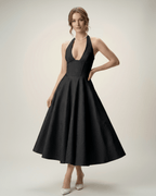 Elegant midi dress by Lauven featuring a halter neckline and A-line silhouette, perfect for sophisticated occasions.